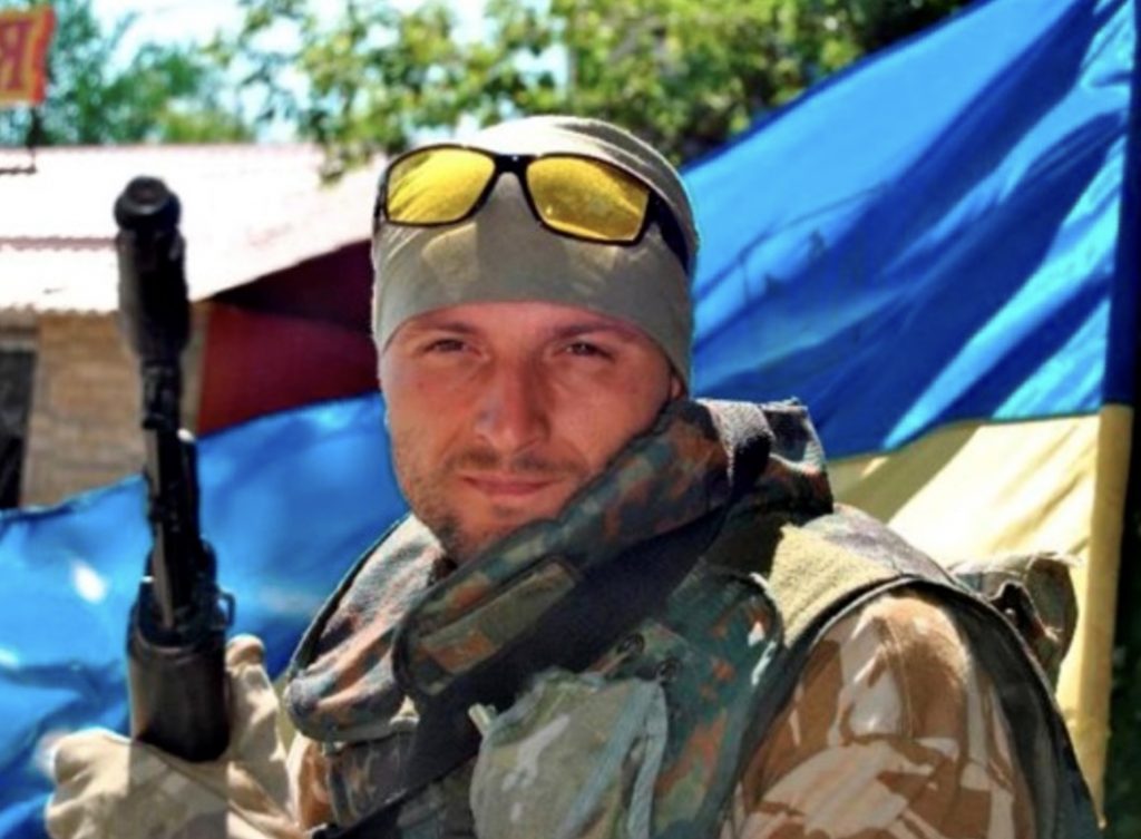 Ukrainian Soldier with Flag in Anti-terrorist Operation